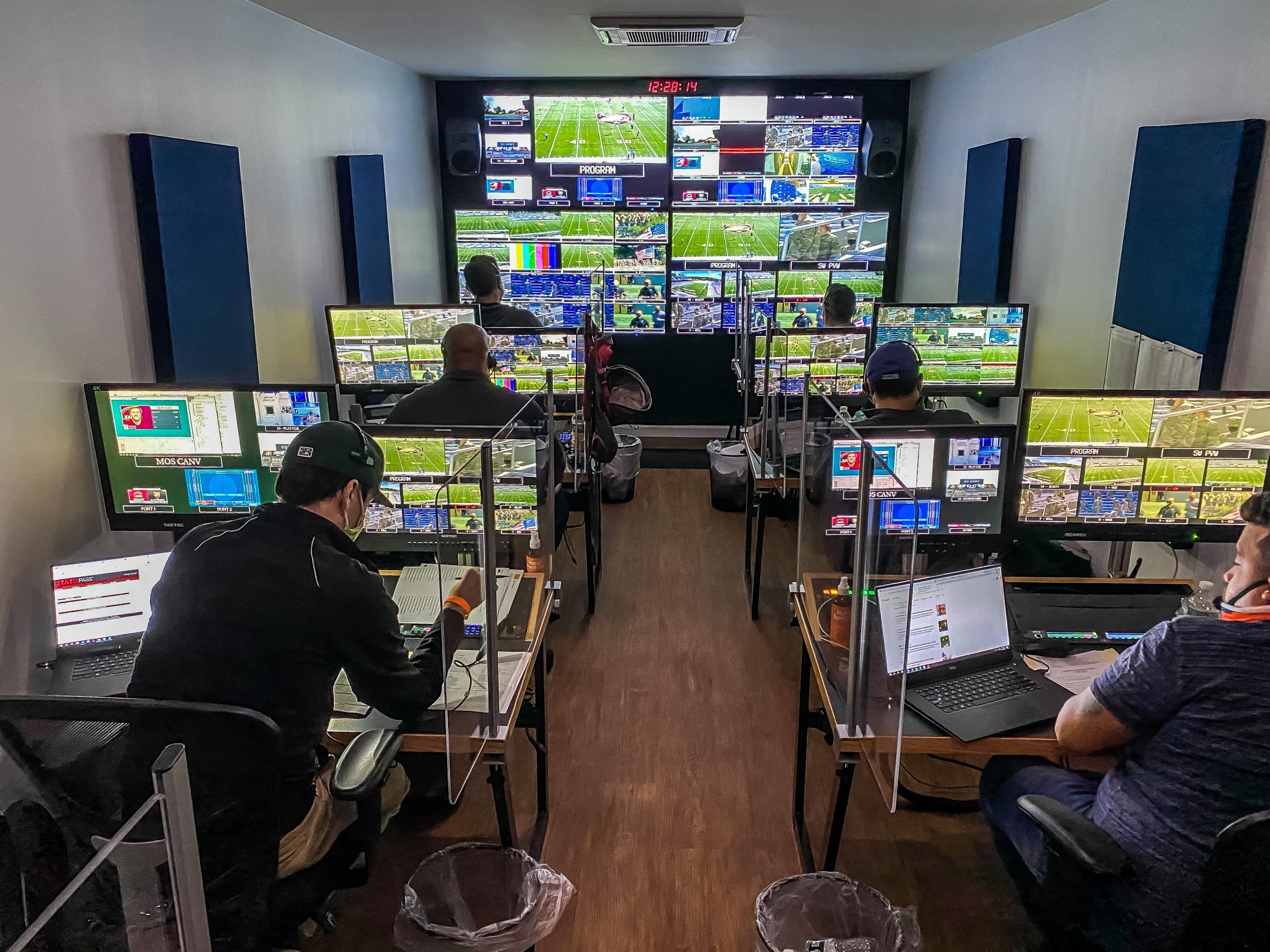 National Lacrosse League control room with operators using Viz Flowics live graphics